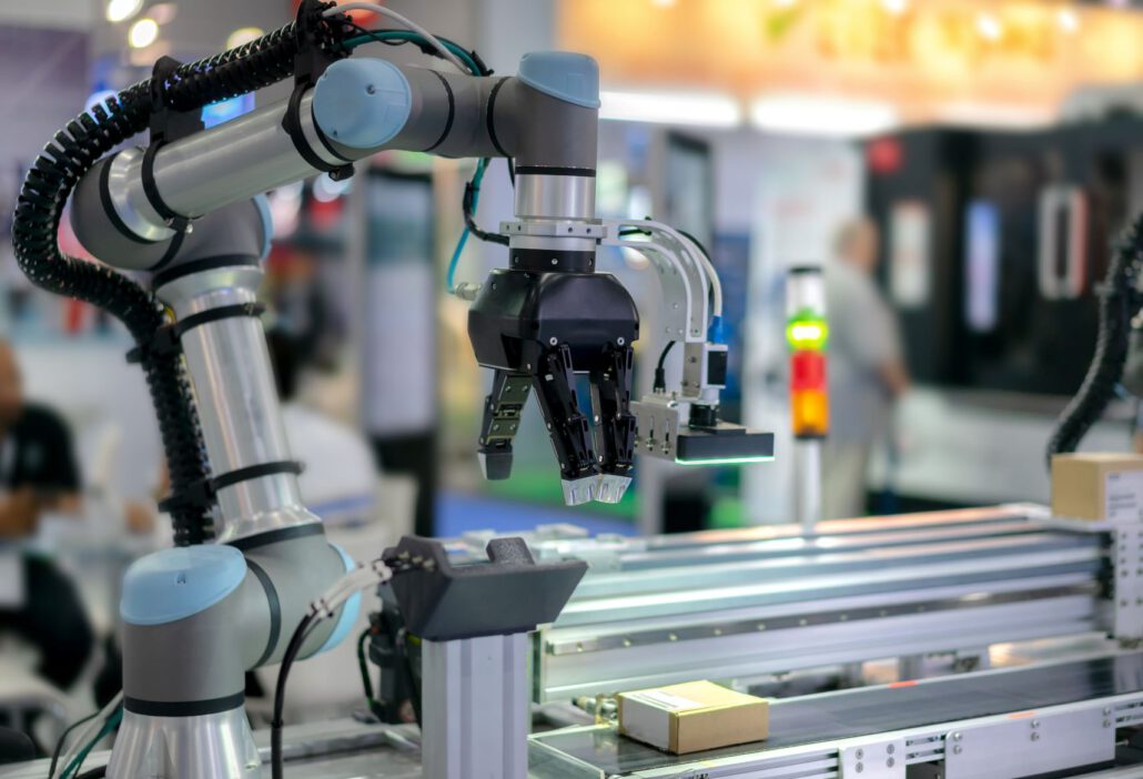 mems sensing and instrumentation robotic arm A robotic arm on a production line usedf to illustrate MEMS sensing applications